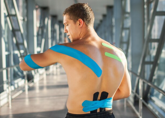 Effects of the direction of Kinesio taping on sensation and postural  control before and after muscle fatigue in healthy athletes